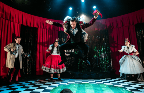 WrongCrowdSnowWhite_left-to-right_Edward-Hole-with-camera_Kuran-Dohil-as-Snow-White_jumping-Matthew-Cavendish-as-Prince-Charming_Eloise-Secker-as-Queen_CreditTheOtherRichard025